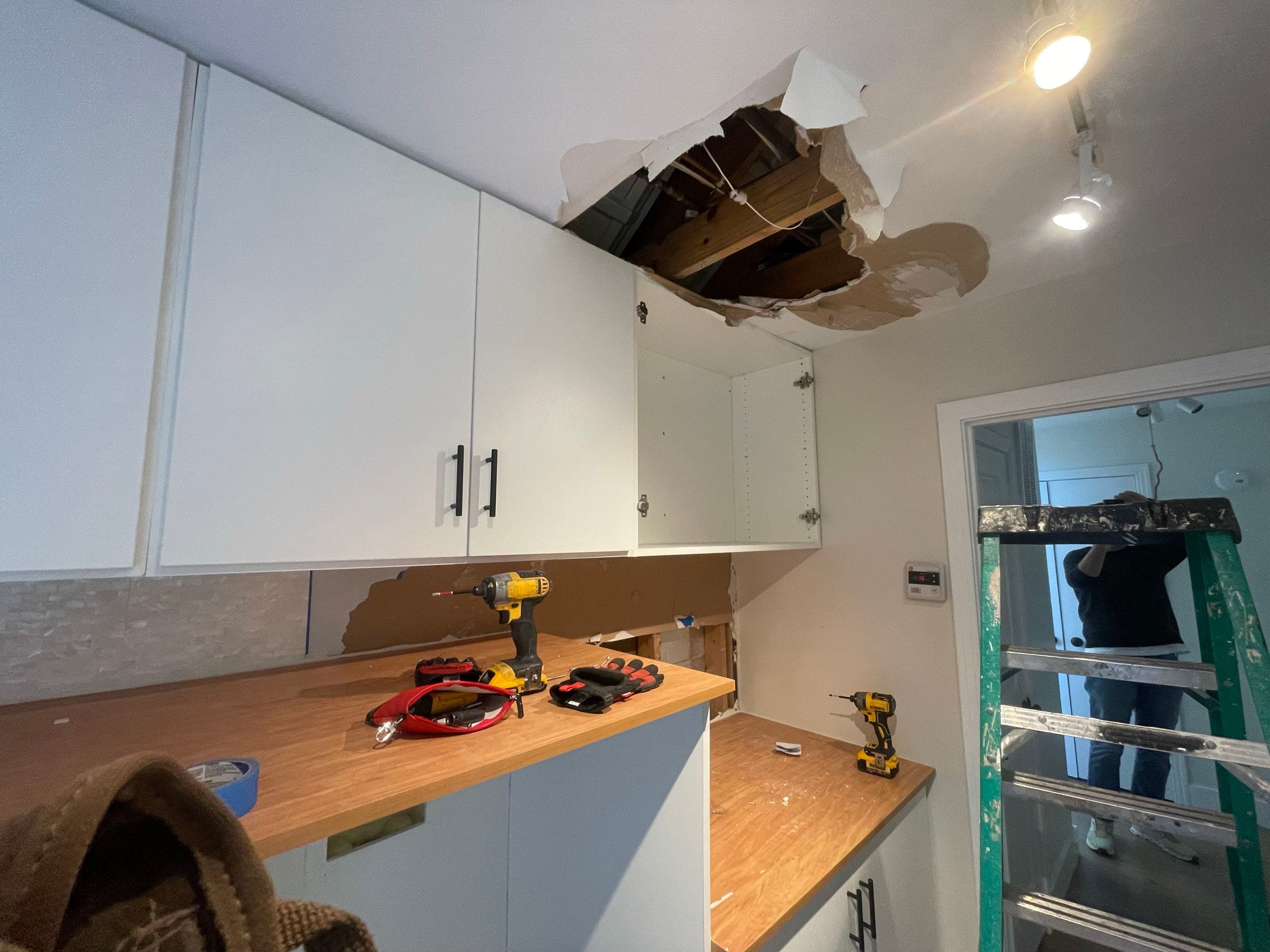 Laundry room & waterfall counter — before